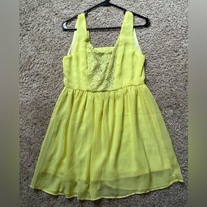 Little yellow open back dress
